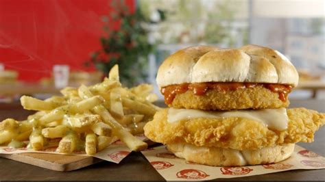 Wendy's Debuts New Cheesy Chicken Sandwich And Garlic Fries