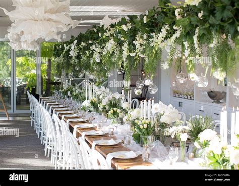 Modern and fresh floral decorations at a wedding reception, The Lake House, Daylesford ...