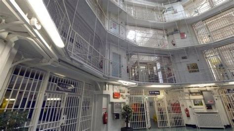 HMP Coldingley prisoners 'throw human waste out of cell windows' - BBC News