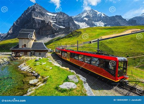 Cogwheel Tourist Train Coming Down from the Mountain, Jungfraujoch ...