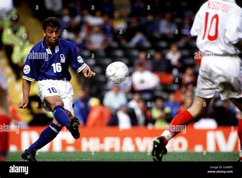 00.00.1996 England. Roberto Di Matteo takes a shot on goal for Italy in ...