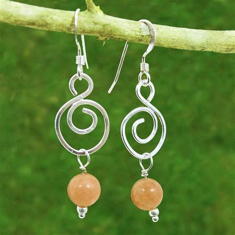 Sunstone Spiral Healing Earrings | Etsy | Healing earrings, Etsy earrings, Healing stones jewelry