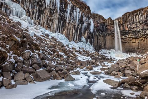 Svartifoss waterfall surrounded with dark hexagonal basalt columns