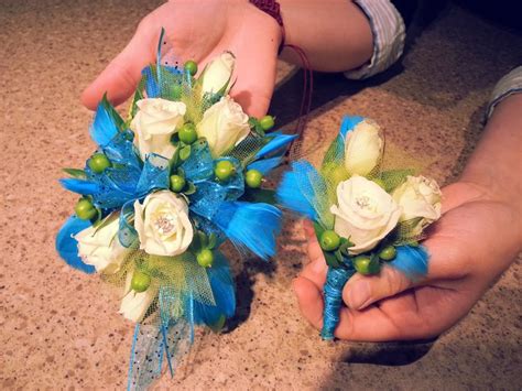 His and hers homecoming corsage and boutonniere. These are to match an aqua dress. #marianos ...