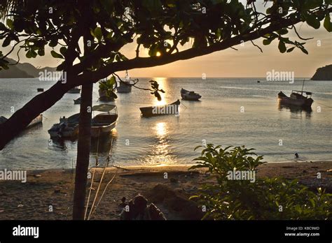 Taganga beach at sunset, Colombia Stock Photo - Alamy