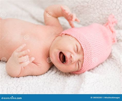 Crying newborn baby girl stock photo. Image of portrait - 38058200