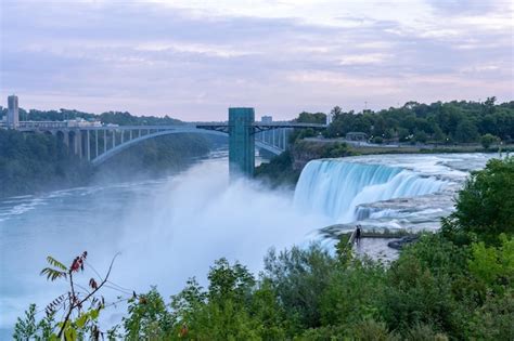 Premium Photo | A view of the american falls with the peace bridge in the background