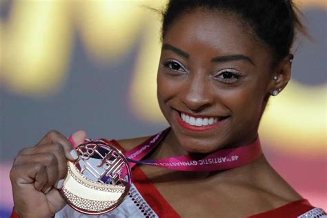 Simone Biles adds gold, silver to record worlds haul