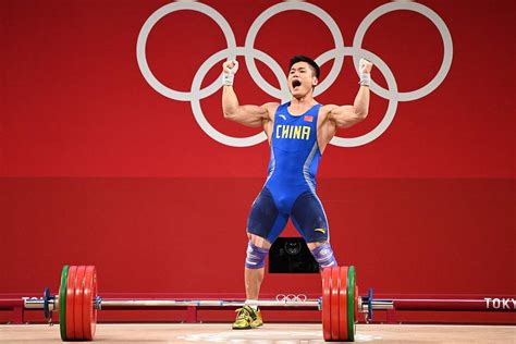 China's Lyu Xiaojun clinches weightlifting 81kg gold at Tokyo Olympics ...