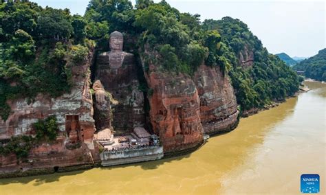 Base of Leshan Giant Buddha exposed due to decreasing water level - Global Times