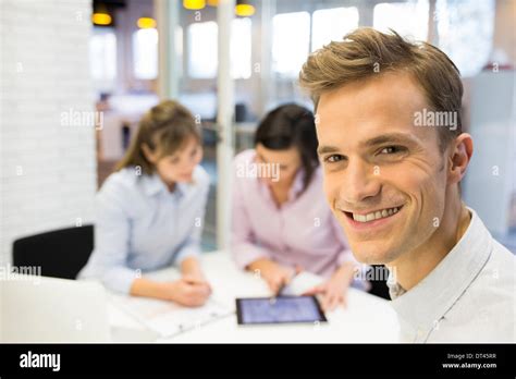Business man reunion office desk colleagues smil Stock Photo - Alamy