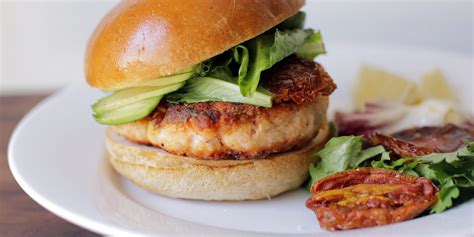 Andrew Zimmern Cooks: Salmon Burgers with Roasted Tomatoes & Avocado ...