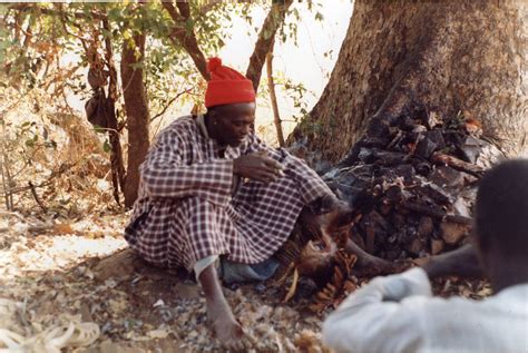 Famous Bedik diviner outside Iwol, southeast Senegal (West Africa). He predicted outcomes by ...