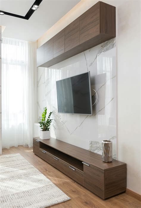 Interior of modern living room with TV on wall · Free Stock Photo