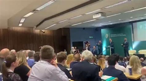 IRELAND: CHAOTIC SCENES AS MICHEÁL MARTIN SPEECH INTERRUPTED BY ANTI-NATO PROTESTOR'S