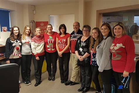 Surgery and Pharmacy staff don Christmas jumpers for Lingen Davies ...