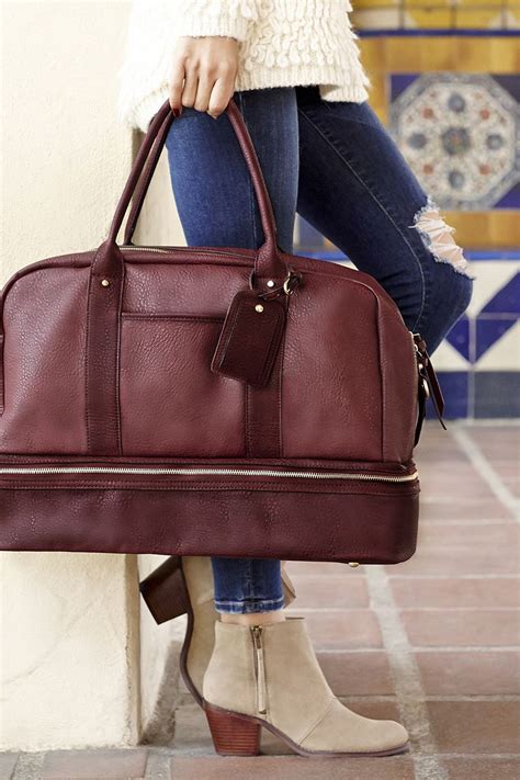 Stylish oxblood weekender bag with a bottom shoe compartment, perfect for upcoming fall & winter ...