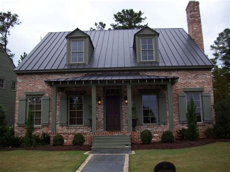 brick house with metal roof - Google Search … | Brick exterior house ...