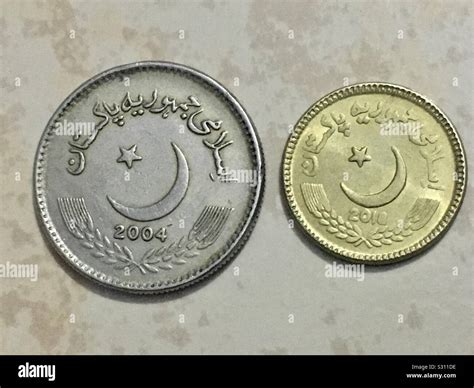 Tails sides of two Pakistani coins of five rupees value each Stock ...