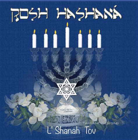 a hanukkah menorah with white flowers and candles on a blue background