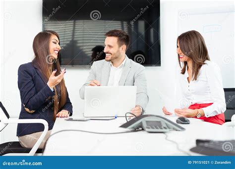 Group of Happy Young Business People in a Meeting at Office Stock Image ...