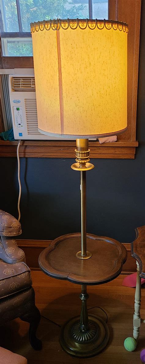 Sidewalk haul: Vintage floor lamp, wrought iron chandelier, circle plant holder, and a vintage ...