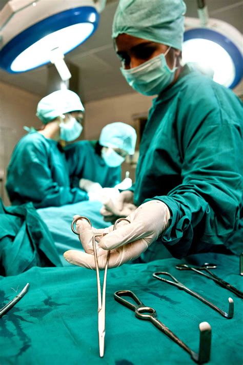 surgeons performing surgery in an operating room
