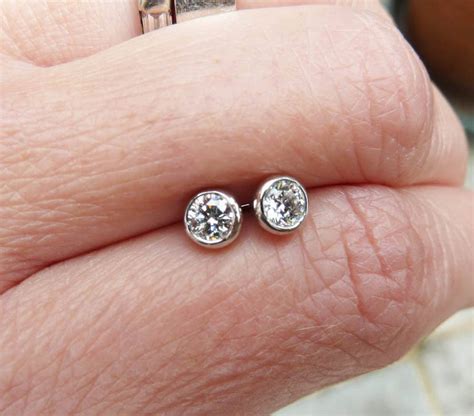 platinum diamond stud earrings by karen johnson | notonthehighstreet.com