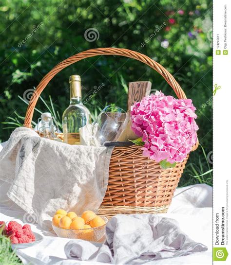 Closeup of Picnic Basket with Drinks, Fruits and Flowers Stock Image ...