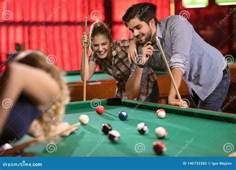 Billiards Game. Group of Friends Playing Pool Together Stock Image ...