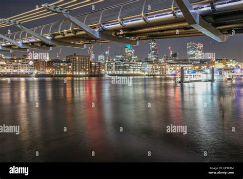 Millennium bridge at night Stock Photo - Alamy