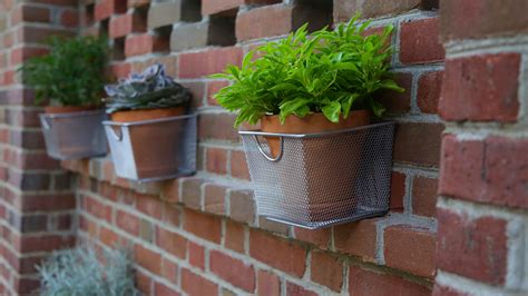 Wall planters work great for breaking up the brick wall. They were easy to install and look ...