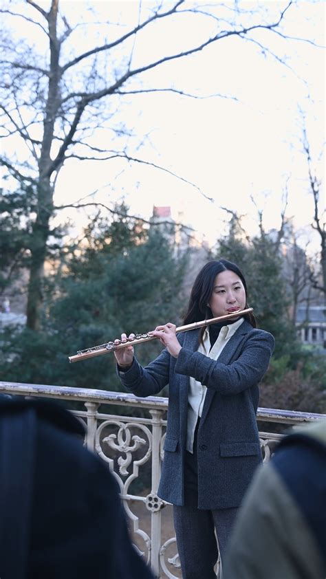 Woman Playing the Flute in Public · Free Stock Video