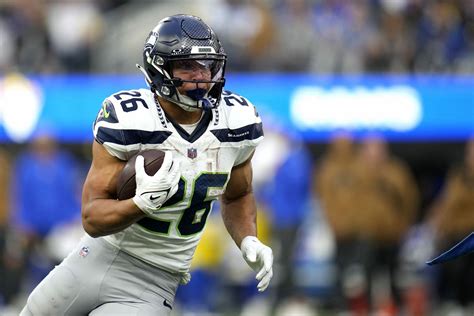 Should you start Zach Charbonnet? Seahawks RB's fantasy outlook, trade ...