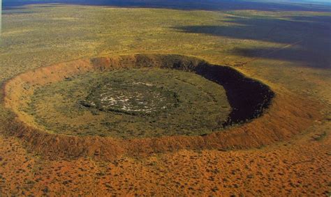 Wolfe Creek Crater is a well-preserved meteorite impact crater in ...