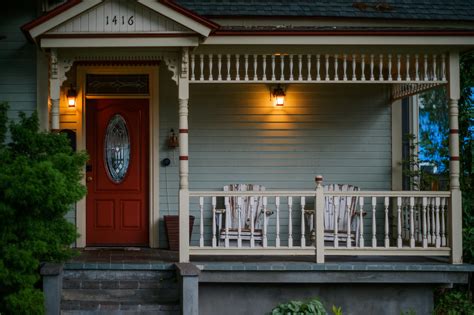 Brown Wooden Door With White Wooden Fence · Free Stock Photo