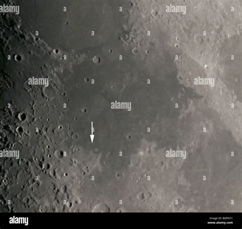 Mare Tranquillitatis. Apollo 11 landing site marked by an arrow Stock ...