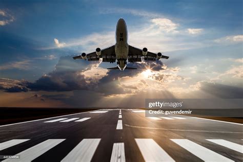 Passenger Airplane Taking Off At Sunset High-Res Stock Photo - Getty Images