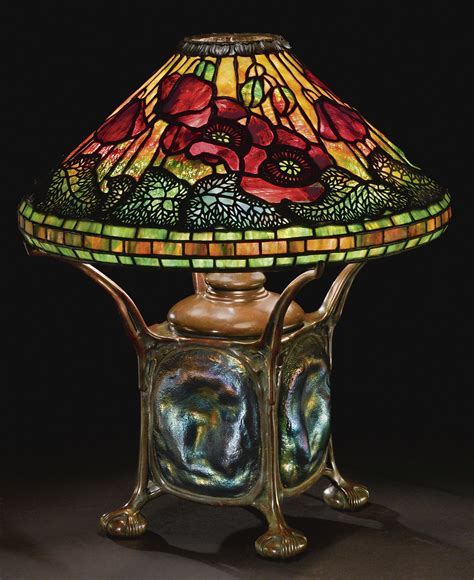 TIFFANY STUDIOS "POPPY" TABLE LAMP with a rare "Turtleback Tile" base, the shade with a rare ...