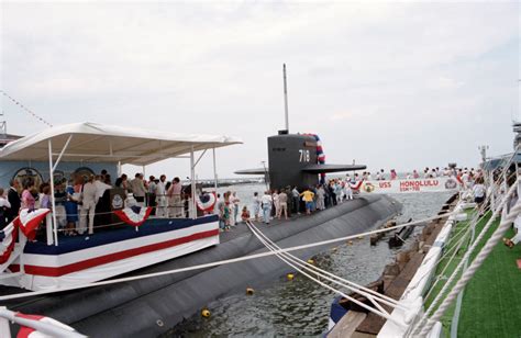 Visitors go aboard the nuclear-powered attack submarine USS HONOLULU ...