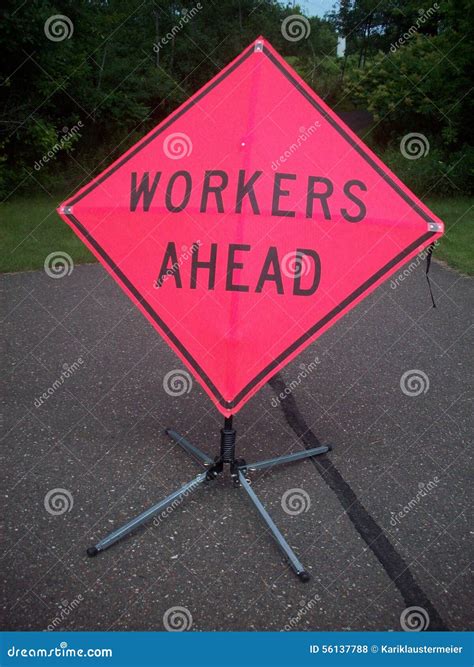 Workers Ahead Sign stock photo. Image of orange, active - 56137788