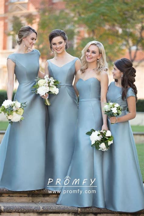 Sleek dusty blue satin elegant mismatched long bridesmaid dresses. Cap ...