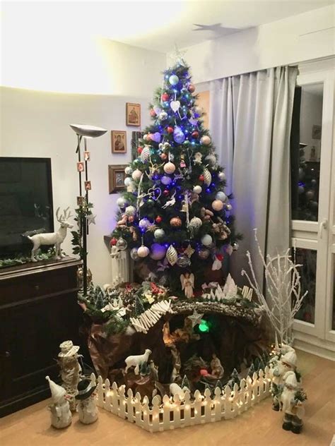 a decorated christmas tree in a living room