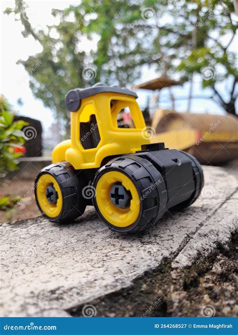 Cute Yellow Toy Tractor Car Stock Image - Image of cute, yellow: 264268527