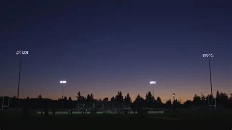 Football Field Lit up at Night | Stock Video | Pond5