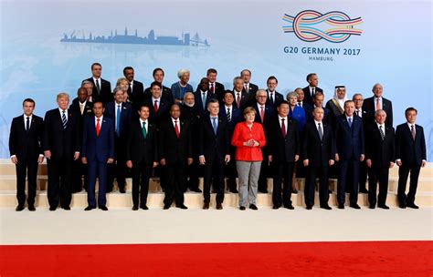 Trump, Merkel, Putin... the gang's all here as leaders pose for 'family photo' at G20 summit