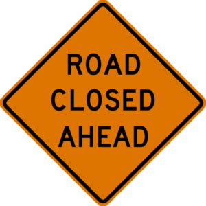 road closed sign - The Rhino Times of Greensboro