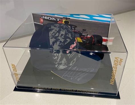 Max Verstappen Signed Red Bull Cap in Display Case - CharityStars