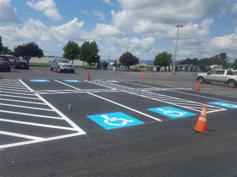 Handicapped Spaces & Parking Signage: How Many Does My Lot Need?