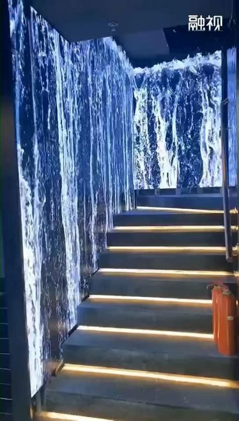 the stairs are covered with icicles and water flowing from them to the ...